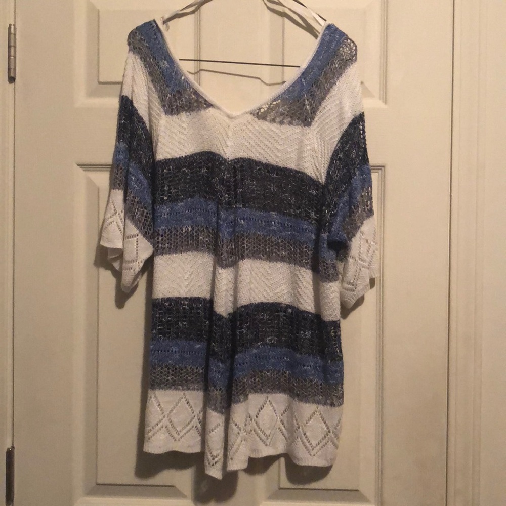 Blue, gray, white, and black striped shirt